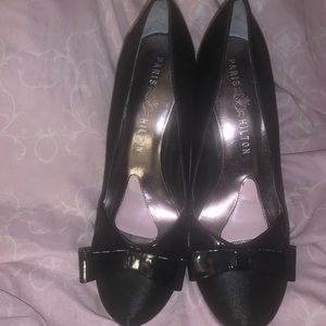Paris Hilton black high heels